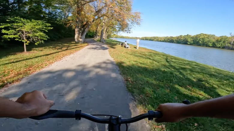 A cyclist's view of Farnsworth Metropark and Maumee River on a clear day