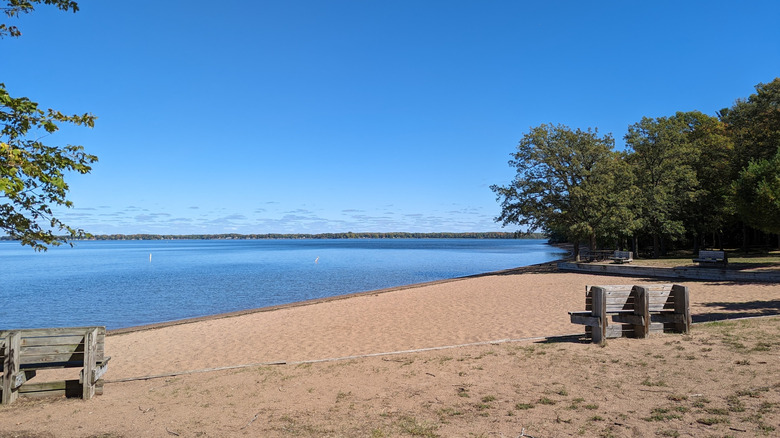 Benches at the sandy beach on Mille Lacs Lake at Father Hennepin State Park