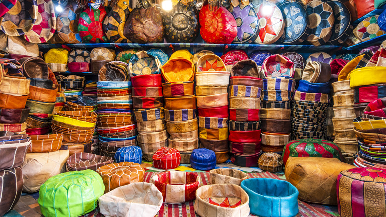 Colorful baskets stacked in market stall in Fes, Morocco