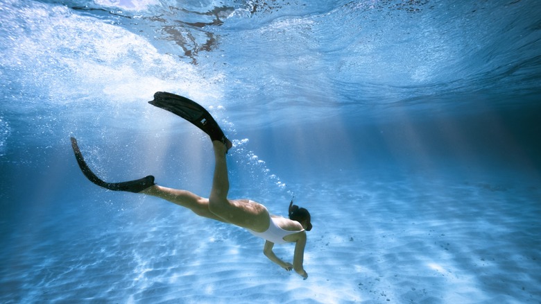 Traveler snorkeling alone