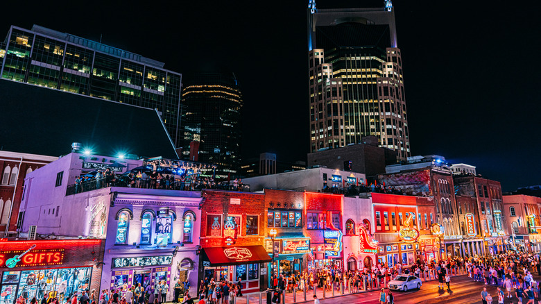 The Batman building and bars along Broadway in Nashville, Tennessee, at night
