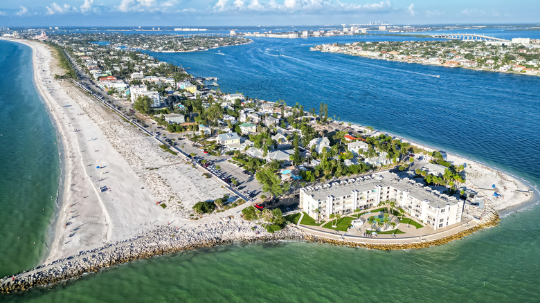 Aerial view of Pass-a-Grille Beach with blue water and white sand near St. Pete, Florida