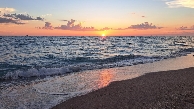 Gorgeous sunset over calm ocean in Venice, Florida