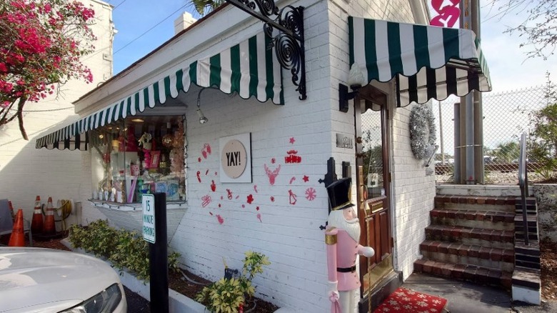 The outside of Yay! Tiny Shop with awnings and cute decorations