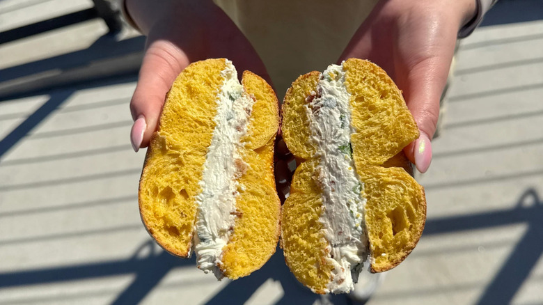 A bagel with cream cheese at Homesick Bagels, Tampa
