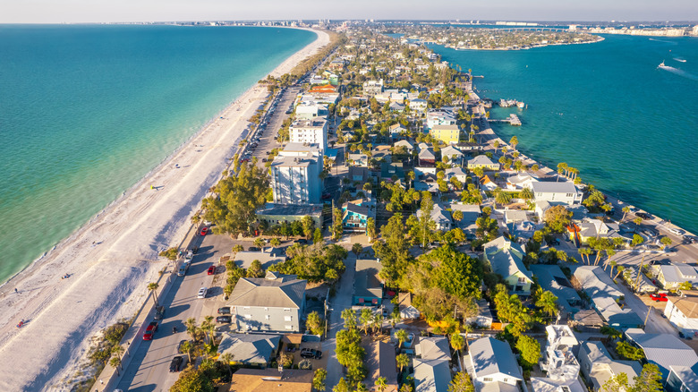 Aerial view of water on both sides of the buildings in St. Pete Beach, Florida