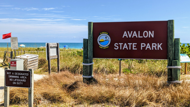 Main entrance front sign to Avalon State Park located on the beach in Florida
