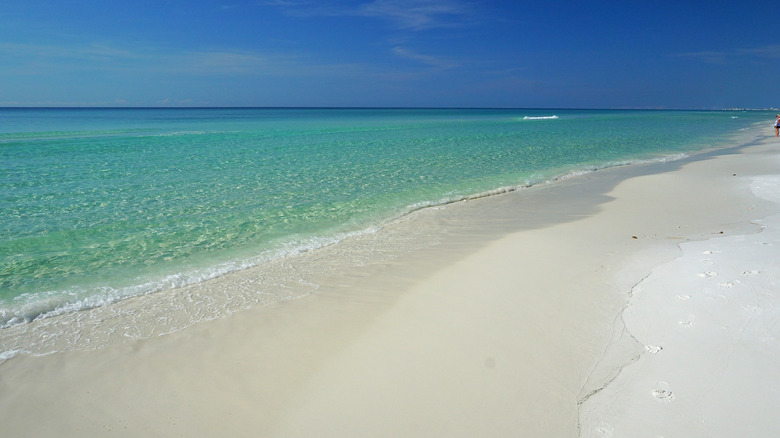 White sugar sand, sand dunes, and emerald waters of Topsail Hill Preserve State Park, Florida