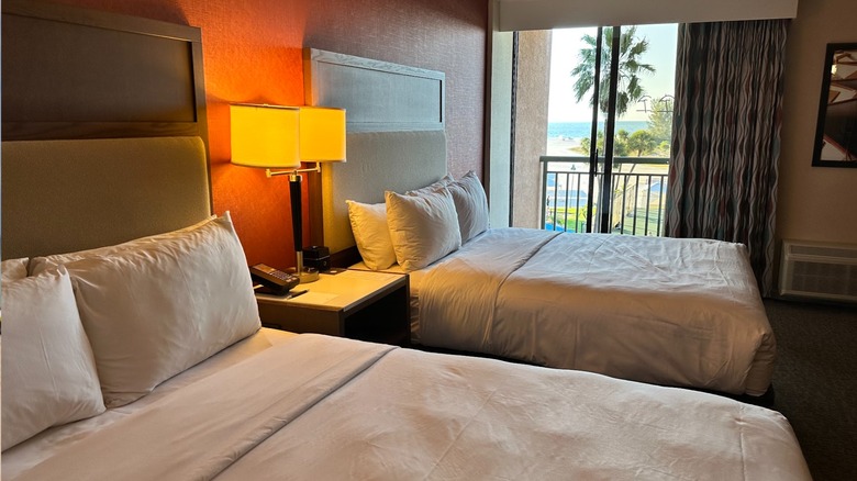 Inside a room looking out toward the beach-facing balcony at the Clearwater Beach Sheraton Resort at Sand Key