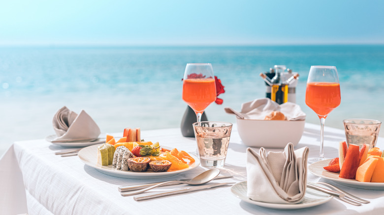 Table set for two on the beach