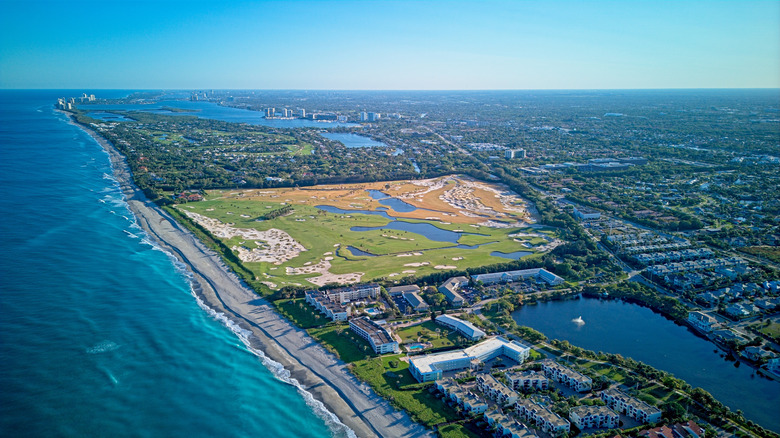 An aerial view of Juno Beach a the golf course in view