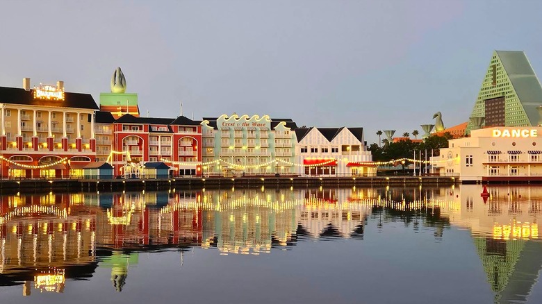 An vew of the buildings reflected on the lake at Disney's Boardwalk