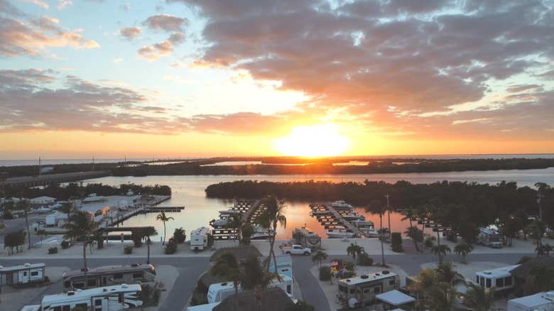 Sun sets over water at Sunshine Key RV Resort & Marina in Lower Florida Keys