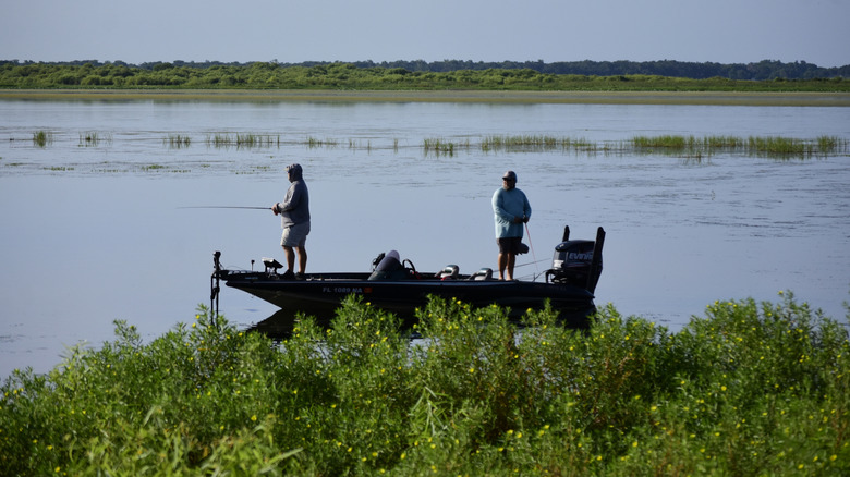 People fishing from a fishing boat on Lake Tohopekaliga in Florida