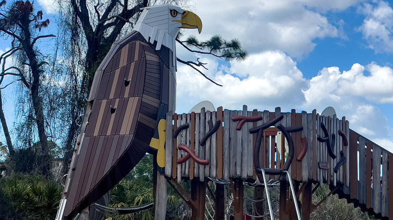 Wooden bald eagle on nest at Cedar Point Environmental Park playground