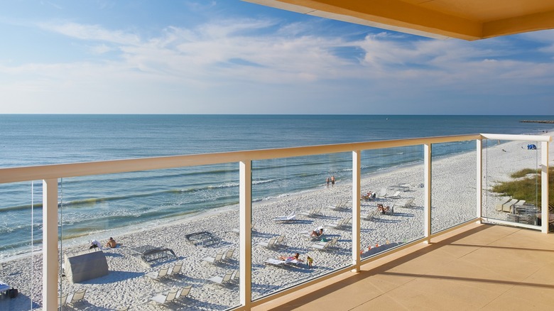 View from a suite balcony overlooking the beach at the Edgewater Beach Hotel
