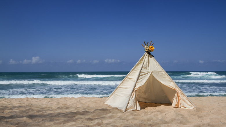 Lonely tent on a sandy beach