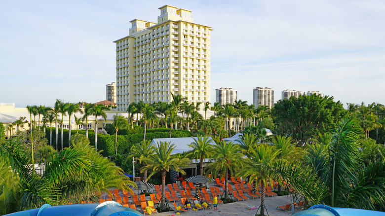 A view of the Hyatt Regency Coconut Resort & Spa in Florida with coconut trees and pools all around
