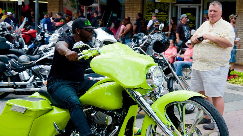 Image of man sitting on a colorful motorcycle during Bikefest in Leesburg, Florida