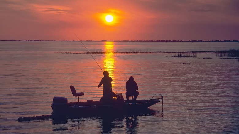 Fishermen casting lines on Lake Okeechobee boat