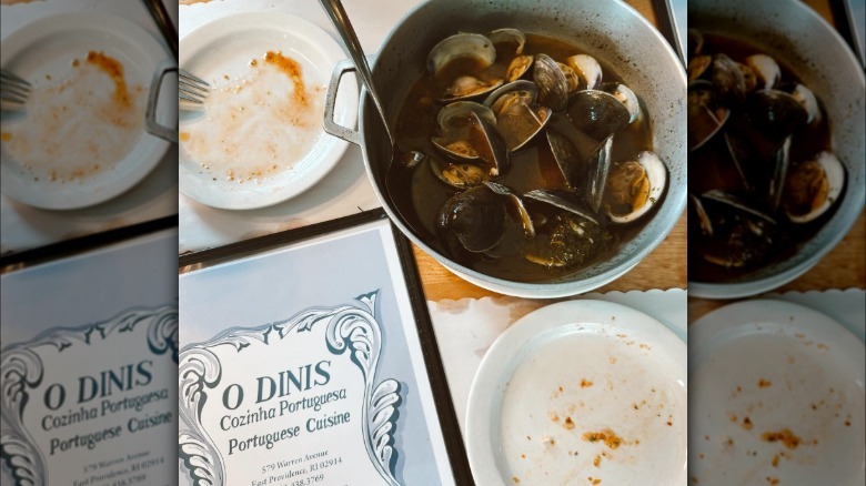 A pot of clams and menu from O Dinis in East Providence, Rhode Island