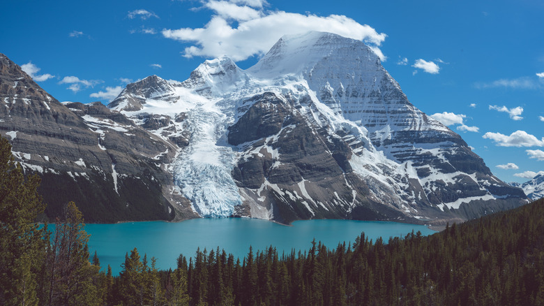 Mount Robson drizzled in snow against Berg Lake