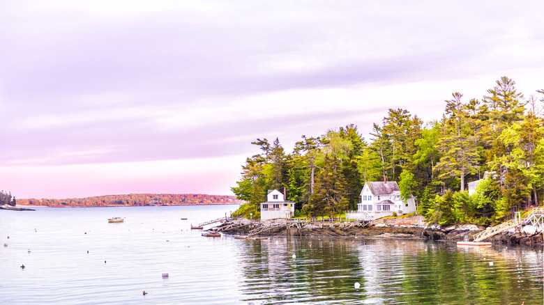 Houses fringe the coastline at Boothbay Harbor on the Mid-Coast of Maine
