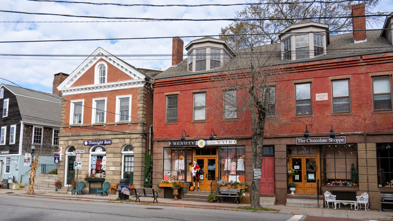 Historical, red brick shops on Main Street in Wickford Village during the winter