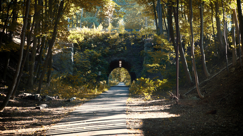 A picturesque spot on the tree-lined Dover Community Trail in Dover, New Hampshire