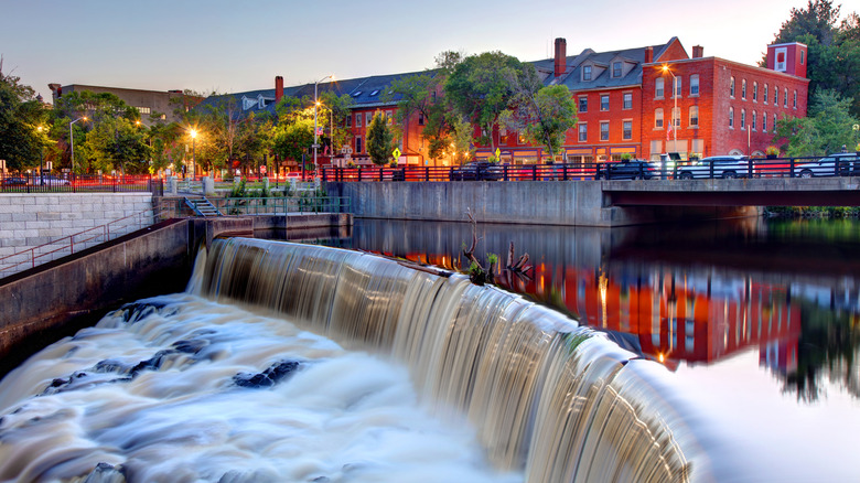 The Cocheco River Waterfall lined with historic buildings in the center of Dover, New Hampshire