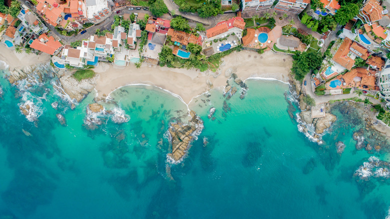 An aerial view of the Rocky coves of Playa Conchas Chinas