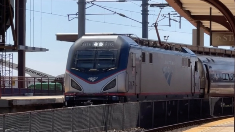 An Amtrak train pulls into the station at New London, Connecticut, on a sunny summer day