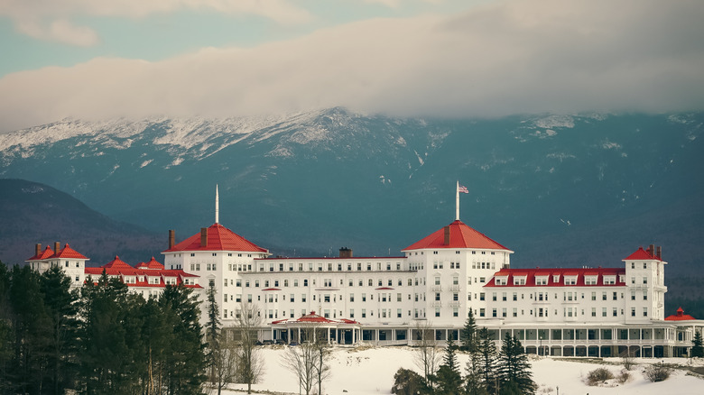 The Mount Washington Hotel in New Hampshire, against a backdrop of snow-capped peaks