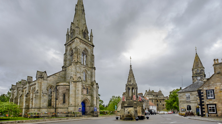 The parish church and fountain in the center of Falkland, Scotland