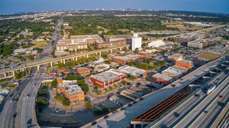 Aerial view of downtown Carrollton, Texas on a late summer afternoon with highways all around