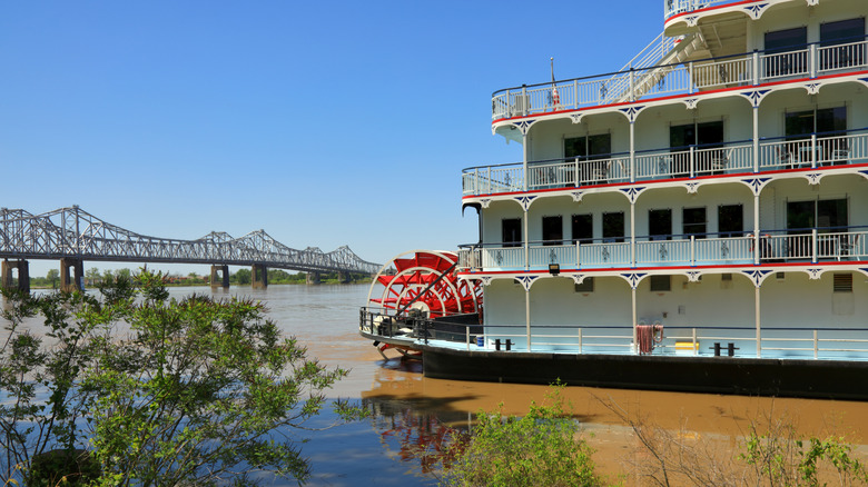 A riverboat next to the city of Natchez
