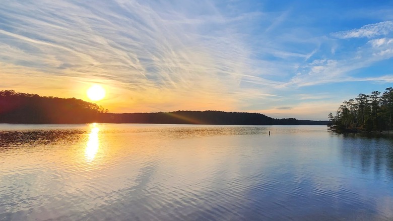 Sunlight streams over the water at Baker Creek State Park in McCormick County, South Carolina