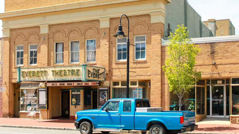 A blue pick-up parked outside the historic Everett Theatre in Middletown, Delaware.