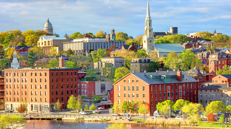 A late afternoon sun shines on the brick buildings and a steepled church in Providence, Rhode Island