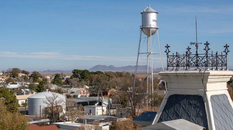 View of water tower and mountain backdrop in Marfa, Texas
