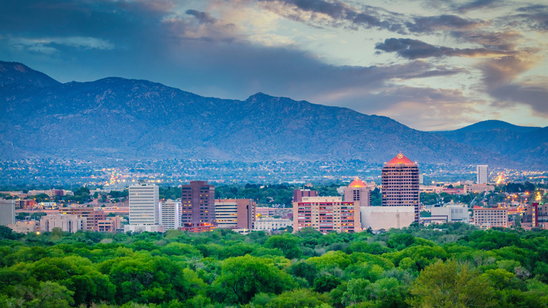 A look at the Albuquerque cityscape as the sun sets with the Sandia Mountains in the background