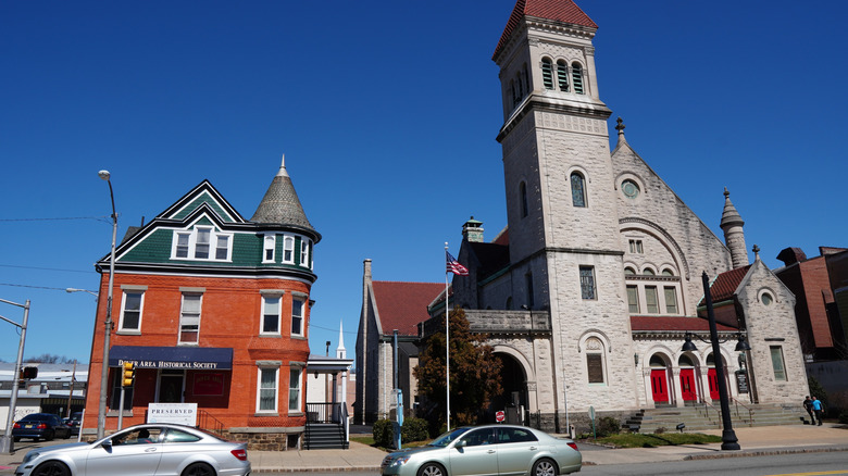 Exterior of church and the Dover Area Historical Society on a sunny day