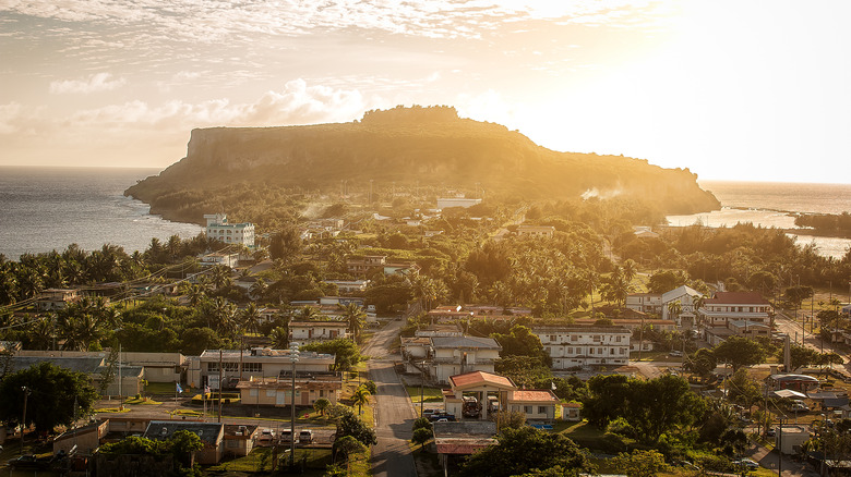A golden haze settles over the town of Songsong on the Northern Mariana island of Rota