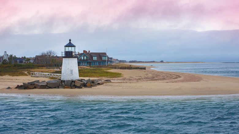 Seascape with Brant Point Lighthouse and dramatic pink clouds in Nantucket