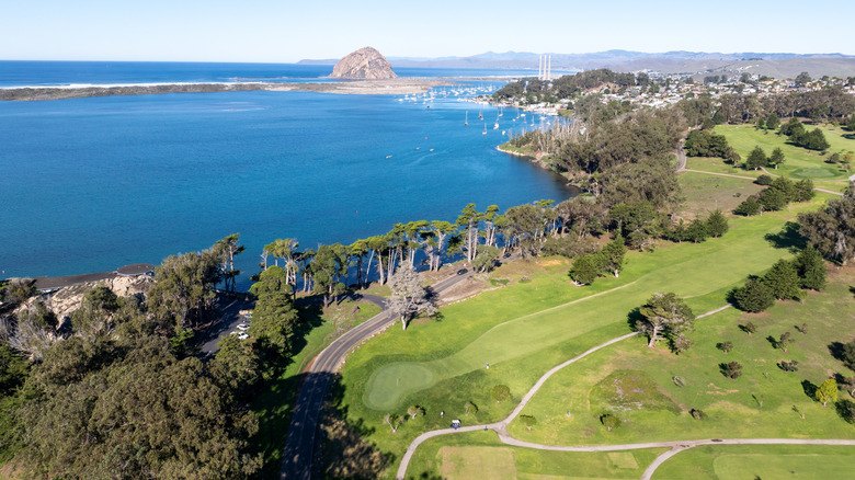 The Morro Bay Golf Course in Morro Bay State Park beside a large lake in California.