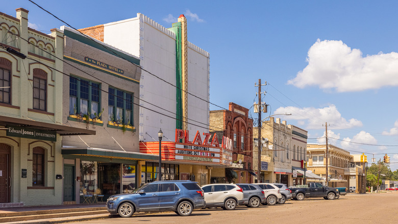 Cars parked in front of businesses in downtown Wharton, Texas.