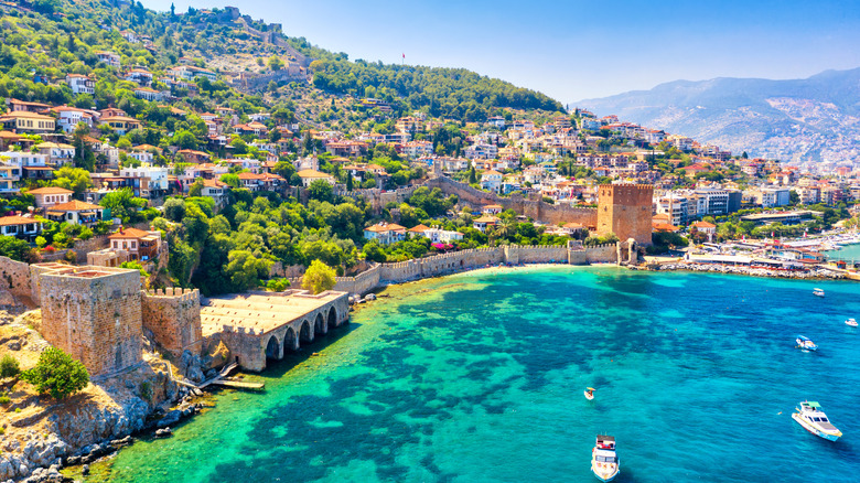 Turquoise cove and historic fortress in Alanya, Turkey on the Mediterranean Sea