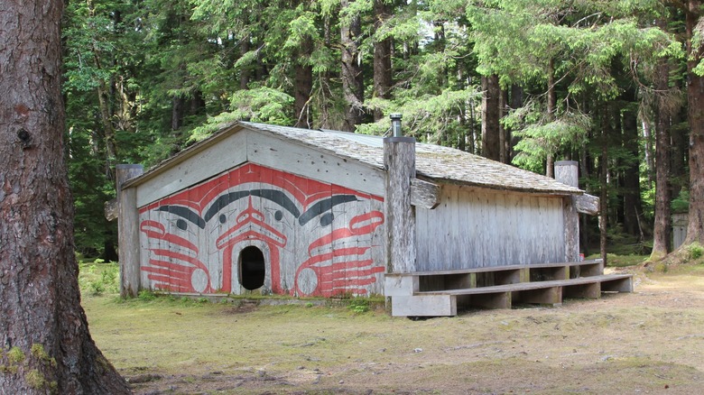 First Nations heritage building in the woods at Gwaii Haanas National Park Preserve.