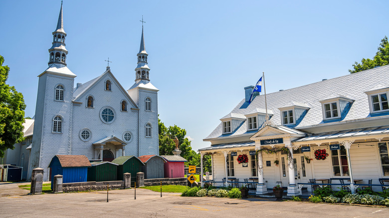 Historic church square and Église Sainte-Famille on a clear day in the center of Cap-Santé, Quebec