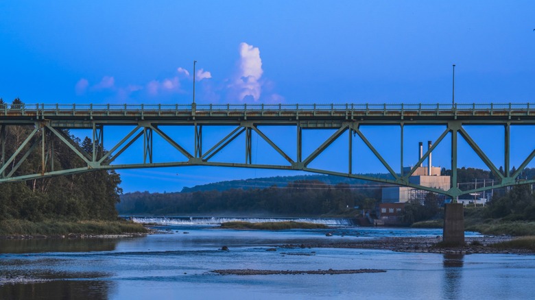 Steel rail bridge over a river in Caribou, Maine
